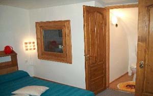 4 person budget apartment with an extra bed, and private facilities (bath and shower)